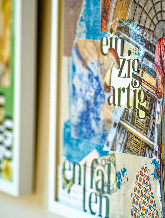 Vibrant close-up of original Silke Gerloff mixed media artwork with colorful paper collage and acrylic paint on canvas in premium furnished apartment Bamberg